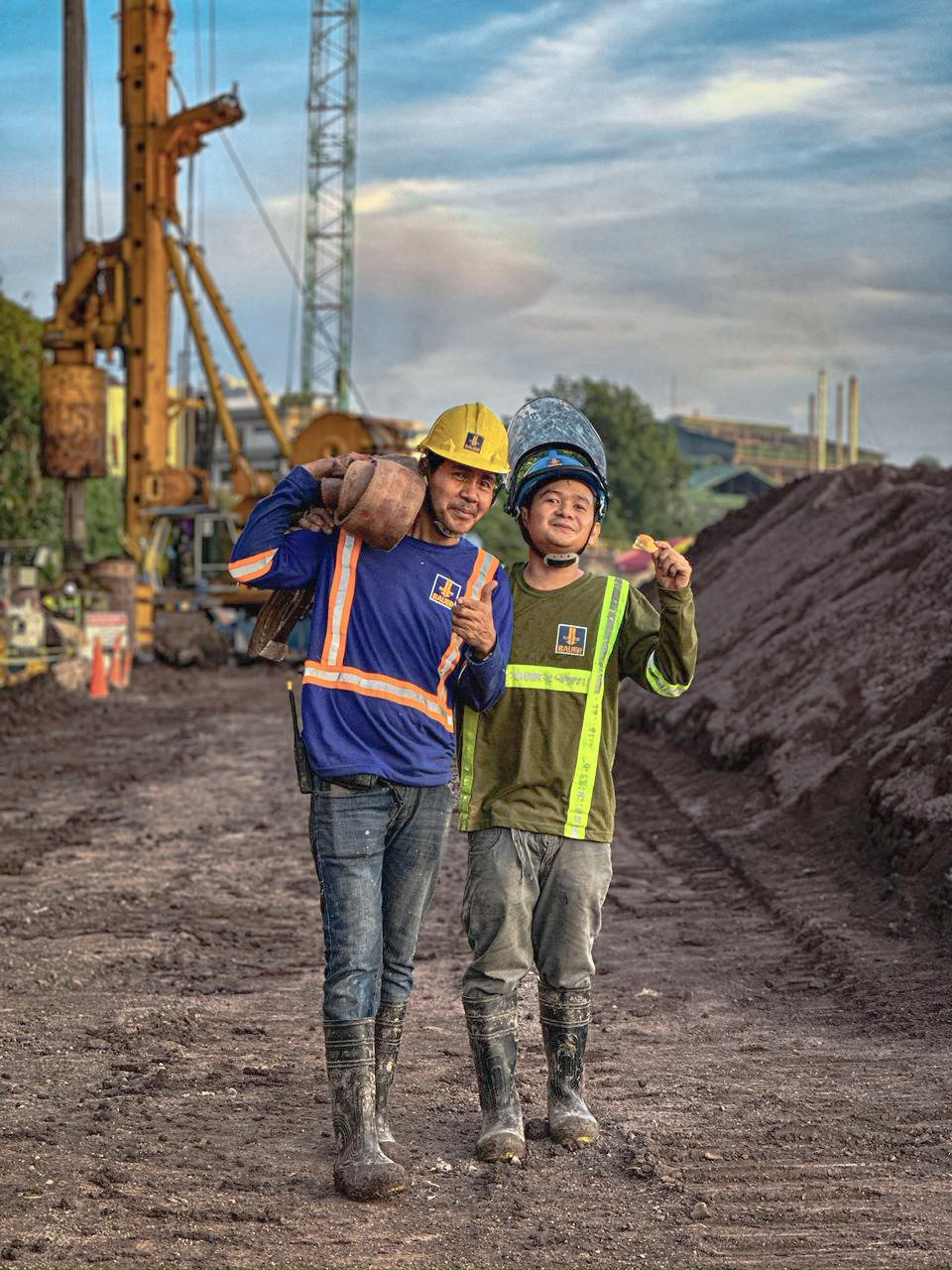 Team members of Bauer Foundations Philippines having fun on a construction site.