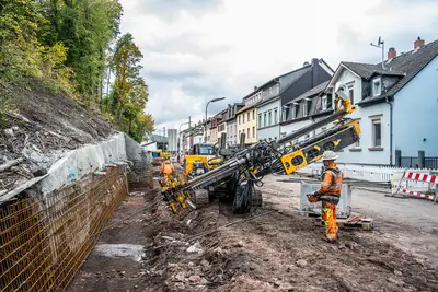 Three hundred grouted anchors were installed to secure the adjacent railway embankment.